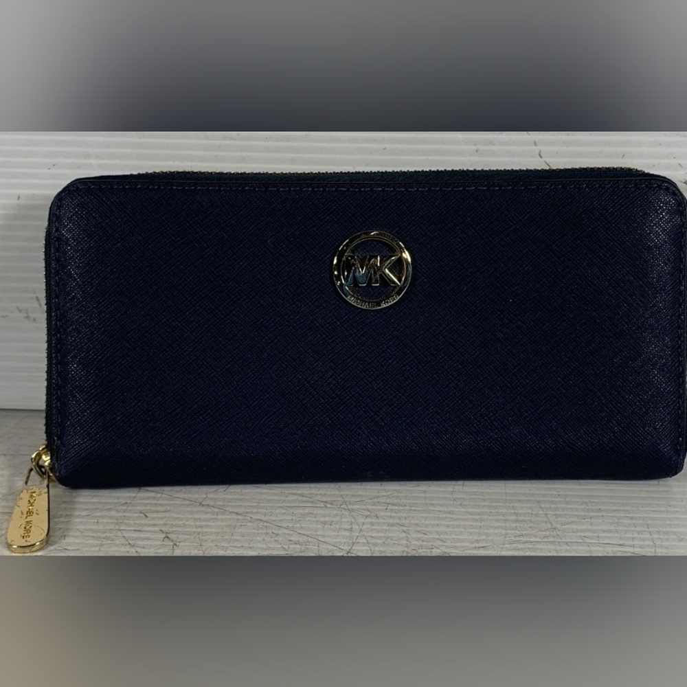 Michael Kors Blue Zip-Around Wallet with Gold Hardware.